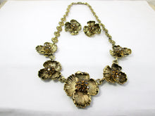 Load image into Gallery viewer, antique gold flower sculpture bib necklace and clip on earrings set