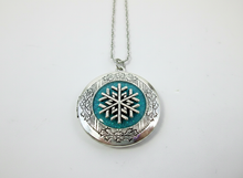 Load image into Gallery viewer, Silver glow in the dark snowflake necklace on cable chain.