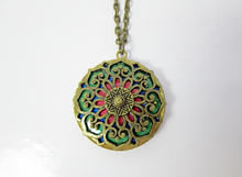 Load image into Gallery viewer, Red and green mandala locket necklace in antique gold tone