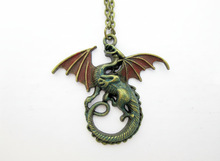 Load image into Gallery viewer, Flying dragon necklace coiled design with vintage red wing accents