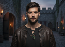Load image into Gallery viewer, A man with short brown hair and a beard wearing a flying dragon necklace coiled design with vintage red wing accents and a brown leather jacket over a black shirt, standing in a stone courtyard with arches and lit torches in the background.  A small "AI-generated visual" appears at the bottom.