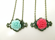 Load image into Gallery viewer, Antique bronze rose filigree pendant necklace in pink and/or mint green.
