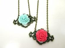 Load image into Gallery viewer, Antique bronze rose filigree pendant necklace in pink and/or mint green.