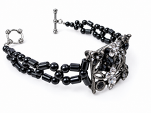 Load image into Gallery viewer, Black and silver flower magnetic hematite bracelet