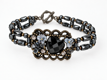 Load image into Gallery viewer, Flower and heart spacer bracelet close-up