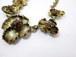 antique gold flower necklace closeup