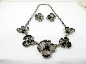 antique silver flower sculpture bib necklace and clip on earrings set