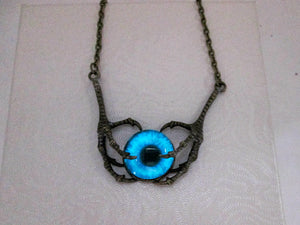 glow in the dark claw eye pendant necklace