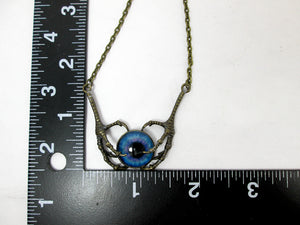 dragon claw and glowing eye necklace with measurement