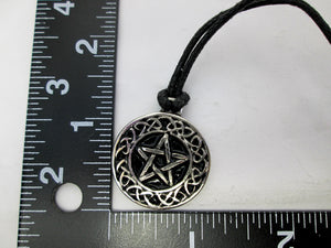 showing measurement of Celtic pentacle pendant necklace, round pendant with black background, on black cord, for unisex teen or adult. (photo taken on a white background)