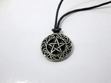 Load image into Gallery viewer, Celtic pentacle pendant necklace, round pendant with black background, on black cord, for unisex teen or adult. (photo taken on a white background)