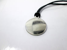 Load image into Gallery viewer, back view of trinity knot pendant on black cord, pendant  polished to mirror finish.