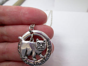 chubby cat pendant close up view