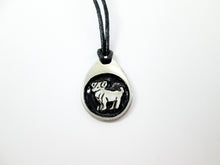 Load image into Gallery viewer, Aries pendant necklace on black cord, teardrop pendant with black background, for man or woman. (picture taken on a white background)