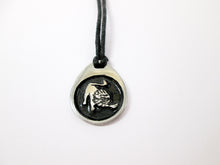 Load image into Gallery viewer, Leo pendant necklace on black cord, teardrop pendant with black background, for man or woman. (picture taken on a white background)