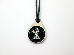 Virgo pendant necklace on black cord, teardrop pendant with black background, for man or woman. (picture taken on a white background)