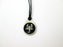 Load image into Gallery viewer, Scorpio pendant necklace on black cord, teardrop pendant with black background, for man or woman. (picture taken on a white background)