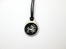 Load image into Gallery viewer, Sagittarius pendant necklace on black cord, teardrop pendant with black background, for man or woman. (picture taken on a white background)