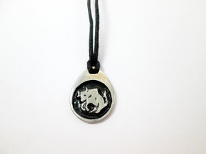 Taurus pendant necklace on black cord, teardrop pendant with black background, for man or woman. (picture taken on a white background)