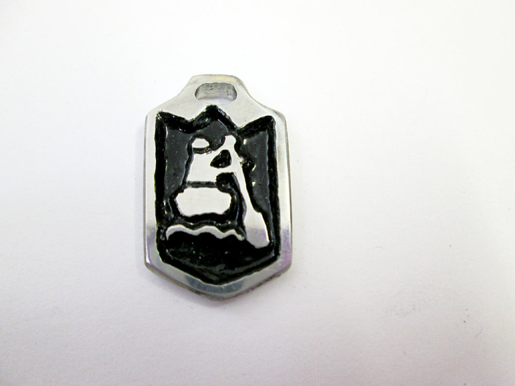 close-up front view of handmade pewter paddler pendant necklace, pendant with black background, for men or women