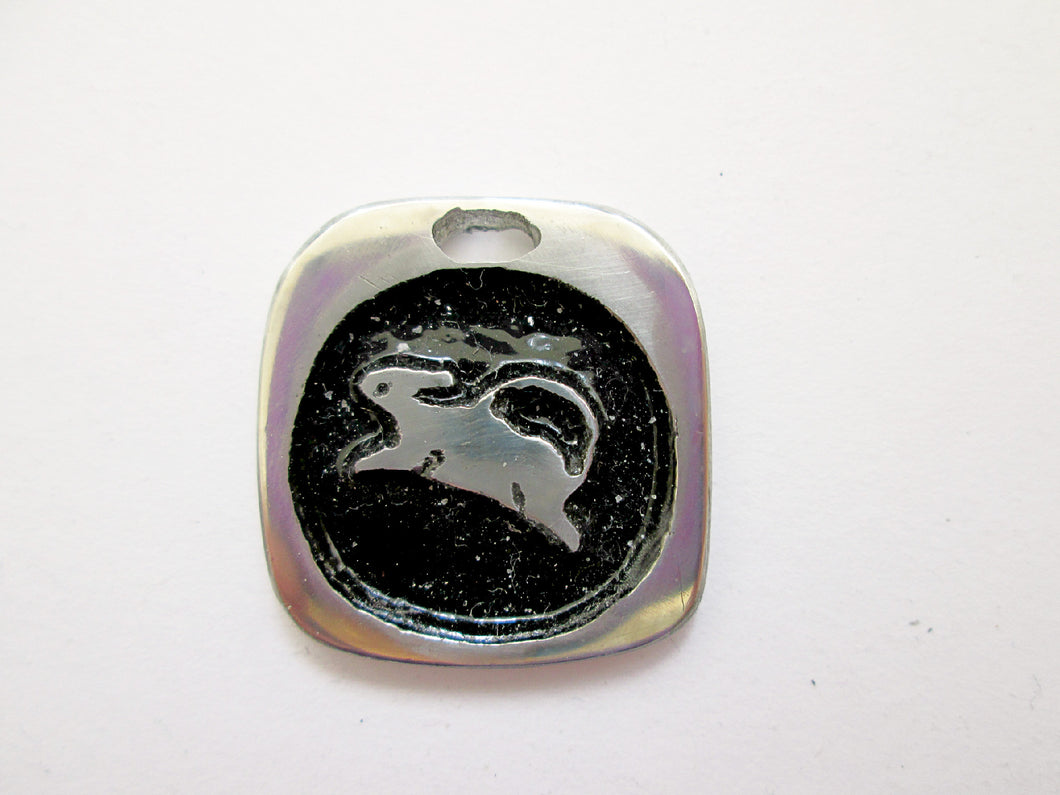 Year of the rat or mouse Chinese zodiac pendant  with black background (picture taken on a white background)