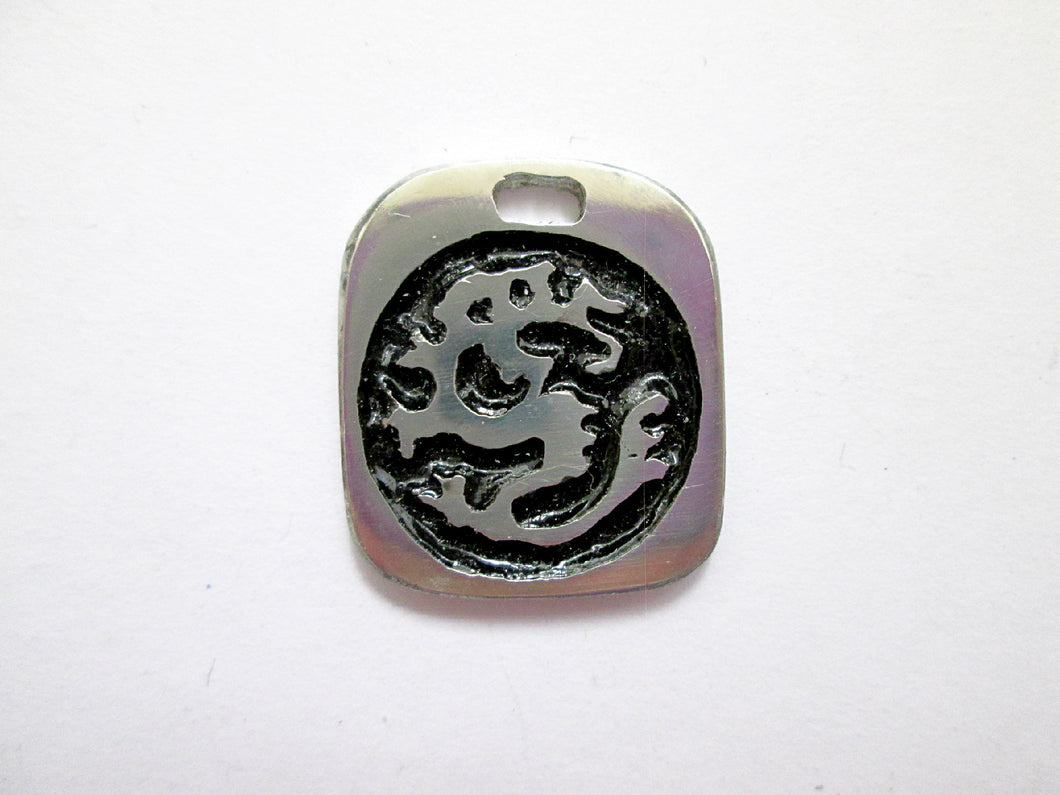 Year of the Dragon Chinese zodiac pendant for unisex, squarish pendant with black background (picture taken on a white background)