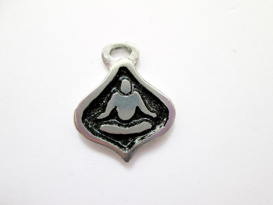 handmade pewter yoga lotus pendant with black background, for men or women.