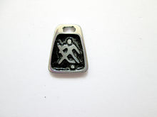 Load image into Gallery viewer, handmade pewter hockey goalie pendant with black background 