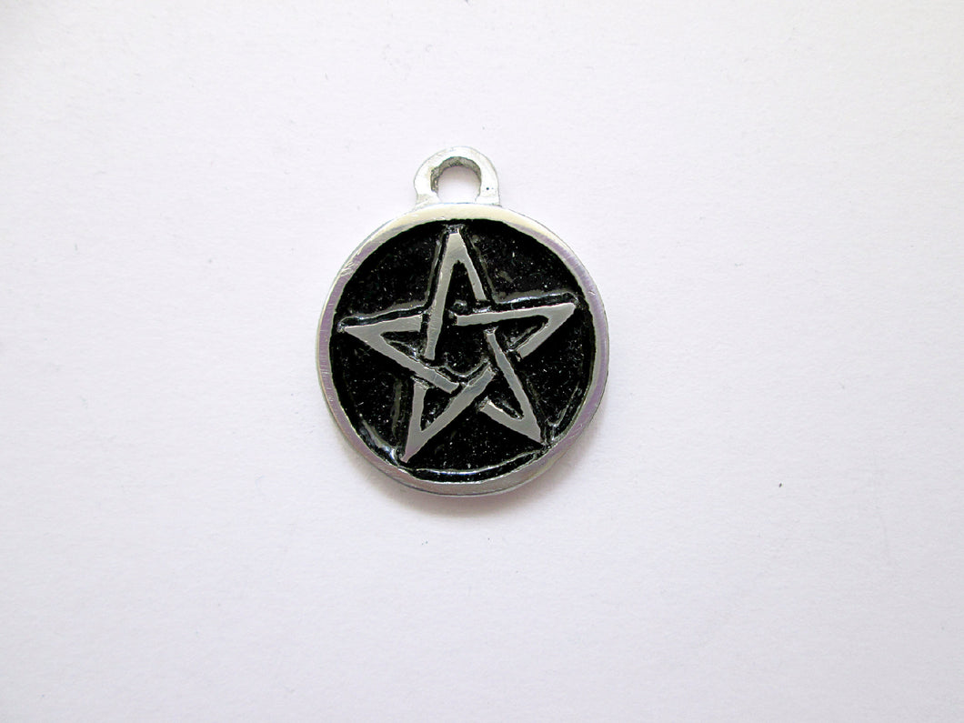 handmade pewter pentacle pendant, round circle pendant with black background.