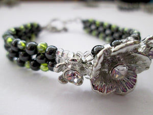 fancy silver flower magnetic bracelet with green beads