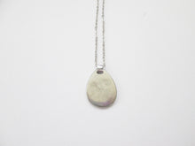 Load image into Gallery viewer, showing back view of horoscope pendant on metal chain, pendant polished to mirror finish.