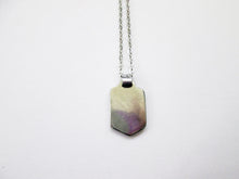 Load image into Gallery viewer, back view of horse rider pendant on metal chain, pendant polished to mirror finish.