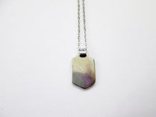 Load image into Gallery viewer, back view of paddler pendant on metal chain,, showing pendant polished to mirror finish.