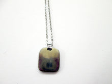 Load image into Gallery viewer, back view of zodiac animal pendant on metal chain, pendant polished to mirror finish.