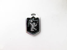 Load image into Gallery viewer, handmade pewter volleyball player pendant with black background.
