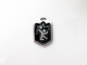 handmade pewter volleyball player pendant with black background.