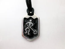 Load image into Gallery viewer, handmade pewter ringette player pendant necklace, pendant with black background, on black cord, for men or women.