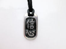 Load image into Gallery viewer, Chinese symbol of confidence pendant necklace, pendant with black background, on black cord.