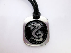 Year of the snake Chinese zodiac pendant necklace for unisex, squarish pendant with black background, cotton cord style. (picture taken on a white background)
