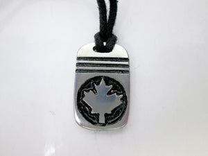 handmade pewter Canada Maple Leaf pendant necklace, pendant with black background, on black cord, for men or women