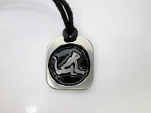Load image into Gallery viewer, Year of the monkey necklace, for unisex, squarish pendant with black background, cotton cord style. (picture taken on a white background)