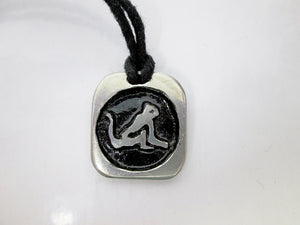 Year of the monkey necklace, for unisex, squarish pendant with black background, cotton cord style. (picture taken on a white background)