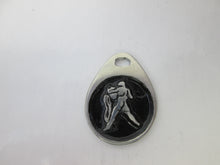Load image into Gallery viewer, Aquarius horoscope pendant with black background, teardrop shaped, for man or woman. (photo taken on a white background.)