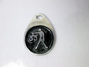 Libra horoscope teardrop pendant with black background, for man or woman. (photo taken on a white background)