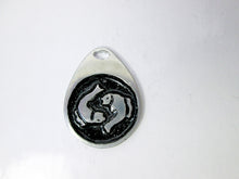 Load image into Gallery viewer, Pisces horoscope teardrop pendant with black background (picture taken on a white background)