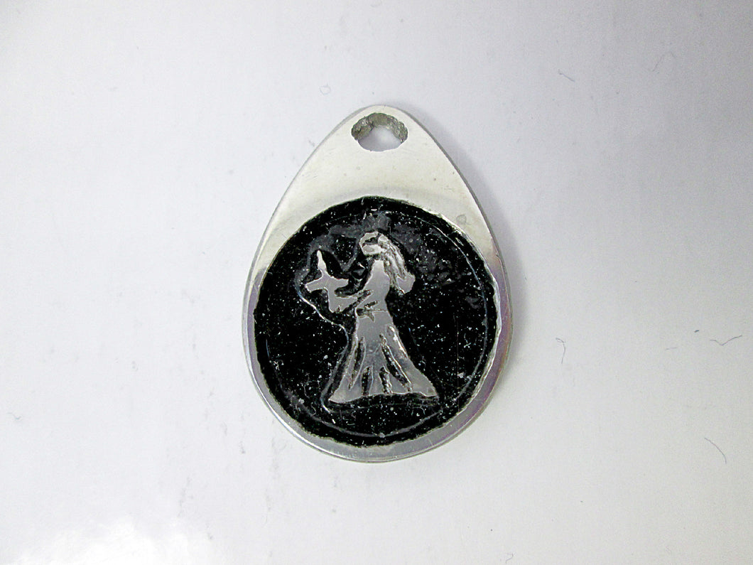 Virgo horoscope teardrop pendant with black background, for man or woman. (picture taken on a white background)