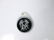 Load image into Gallery viewer, Gemini horoscope pendant with black background, teardrop shape, for man or woman (picture taken on a white background)