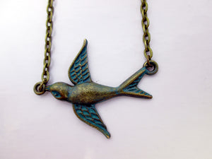 small flying bird necklace