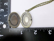 Load image into Gallery viewer, small oval locket with measurement