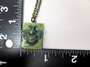 antique style book locket with measurement
